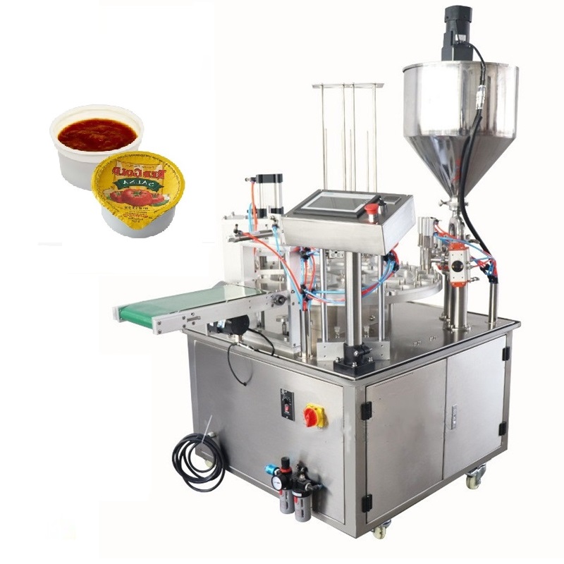 Rotary cup fill seal machine
